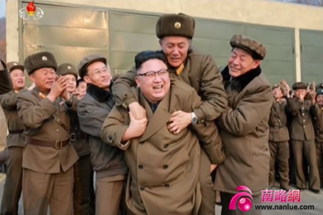 Picture of Kim Jong-un piggybacking a military officer in a photo released on 19 March 2017