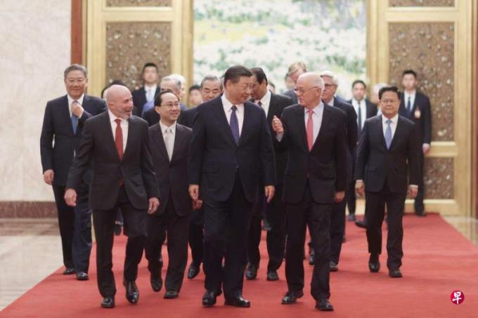 习近平见美企高层 重申改革开放不停顿