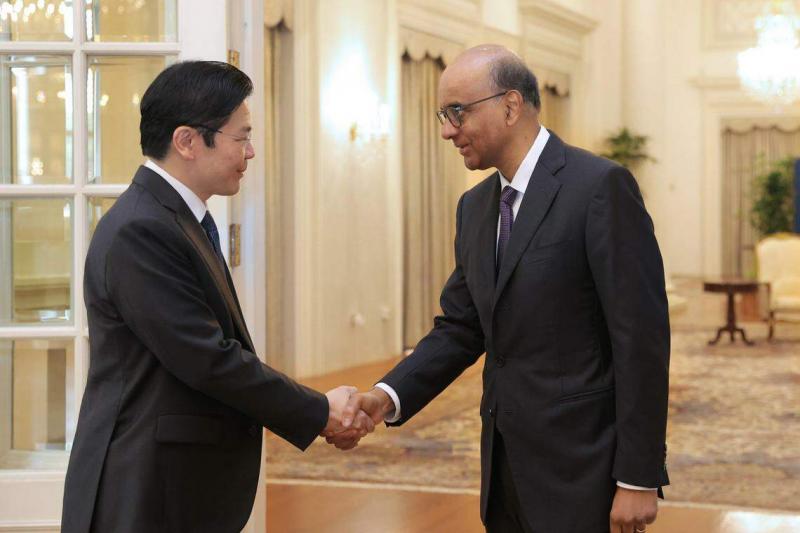 尚达曼总统(右)根据新加坡总理李显龙的建议,委任副总理兼财政部长黄循财(左)为下一任总理,并邀请对方组织新的内阁。(通讯及新闻部提供)