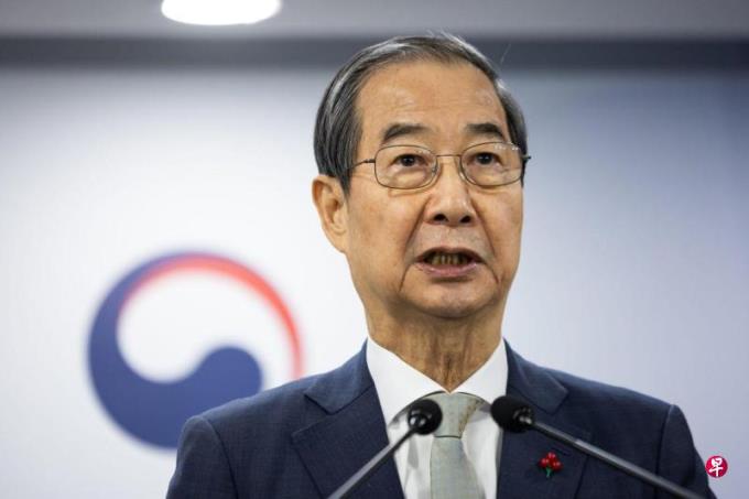 韩国国会表决通过代总统韩悳洙弹劾案