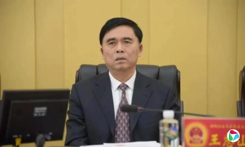 王志山,主动投案